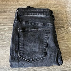 Women’s size 10/30R, A New Day black distressed skinny jeans